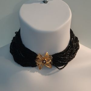 Vintage Beautiful Black strand bead choker with Gold Flower closure